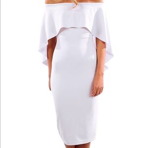 White off the shoulder dress with cape.
